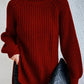 Suéter de algodón de cuello alto y manga raglán con dobladillo dividido